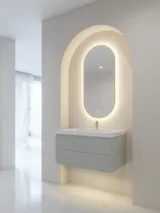 Stilfull og moderne baderomsinspirasjon med ovale speil med lysstyring, steinvasker og servantskap med fine og elegante riller i en minimalistisk design, badet har en lys og luftig atmosfære med elegant belysning og raffinerte detaljer