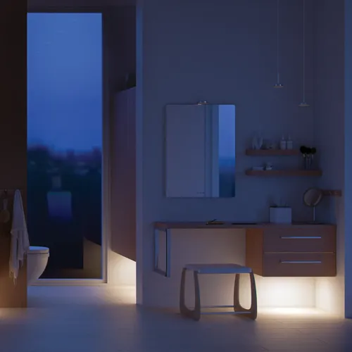 Moderne baderom i nordisk stil med lyst tre, elegant belysning, speilskapvegg og stilfull innredning som skaper en varm og innbydende atmosfære.